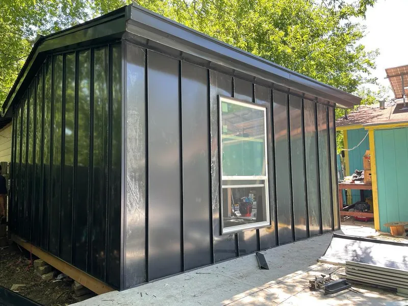 Black standing seam metal wall panels for Metal Roof Installation in Porter