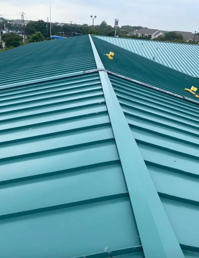 Green commercial metal roof ridge and valley for Metal Roof Repair in Porter